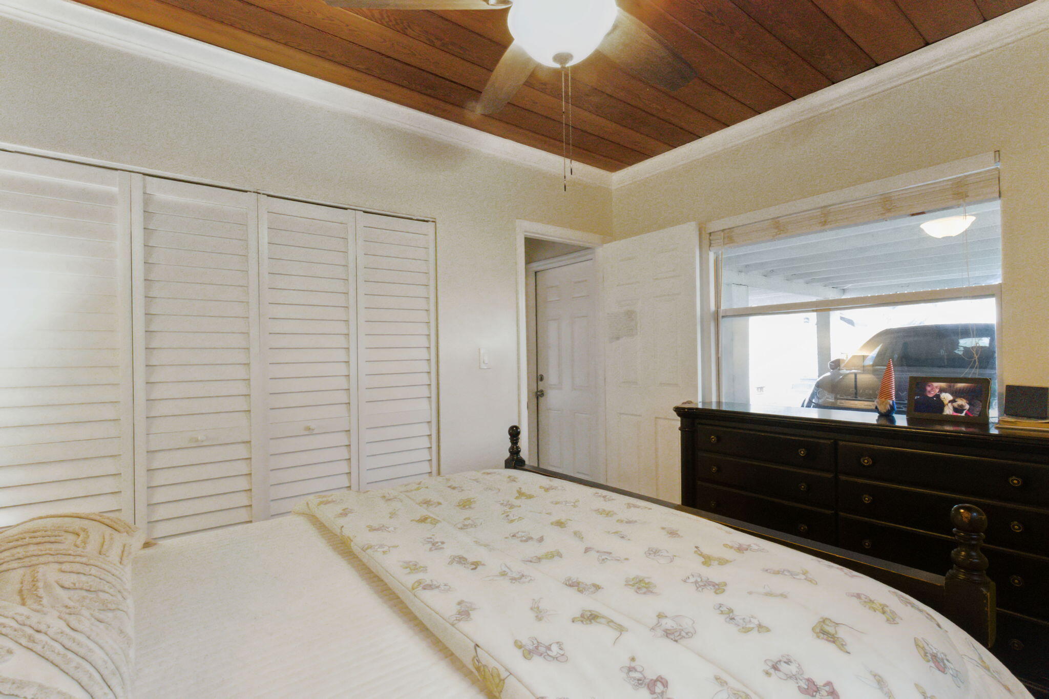 614 North 7th Street, Unit 1/2 Lantana, FL 33462 - Photo 13 of 18 a bedroom with a bed and a dresser