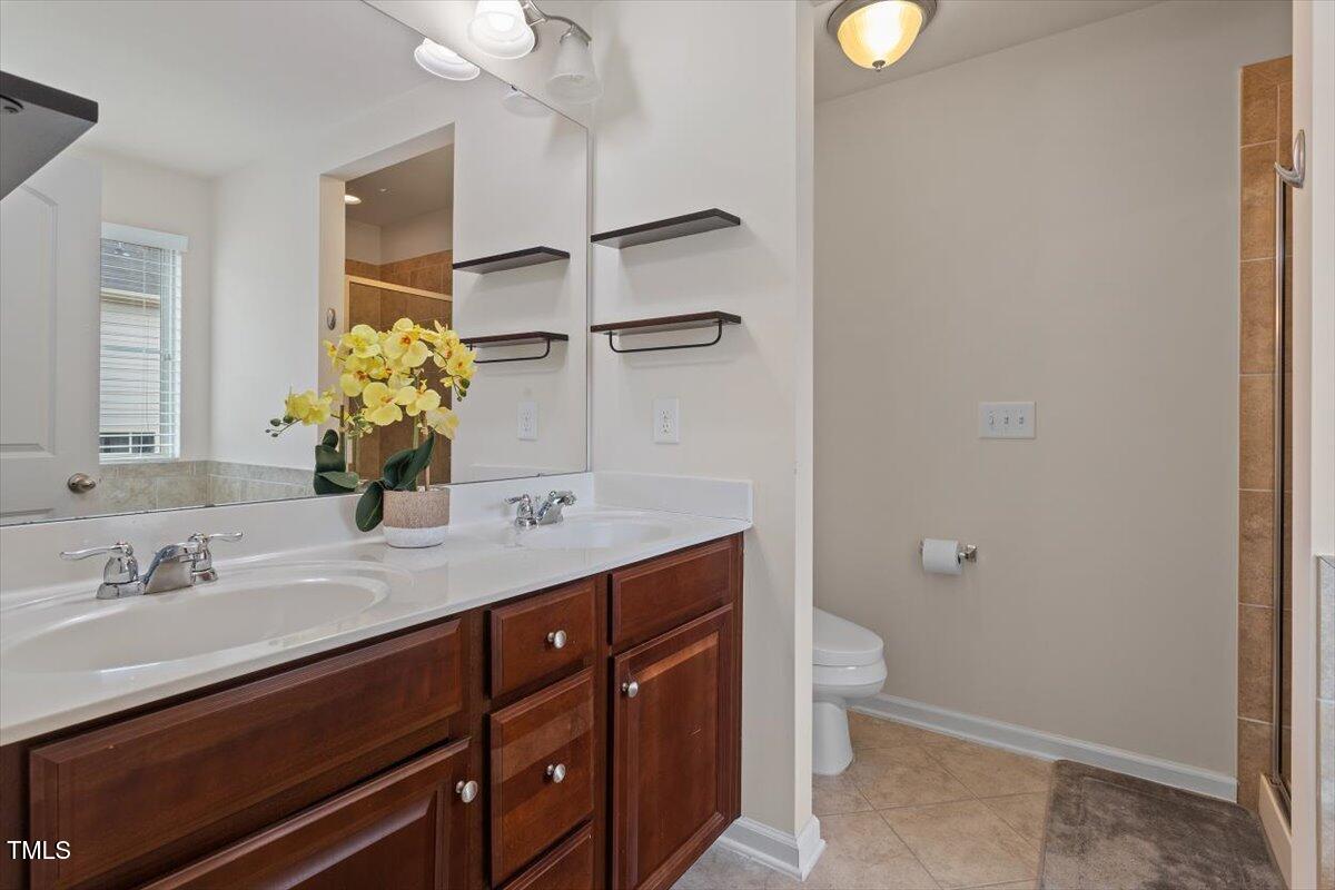 9329 Falkwood Road Raleigh, NC 27617 - Photo 13 of 19 Primary Bathroom