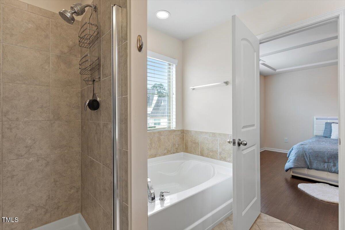 9329 Falkwood Road Raleigh, NC 27617 - Photo 14 of 19 Separate shower & tub