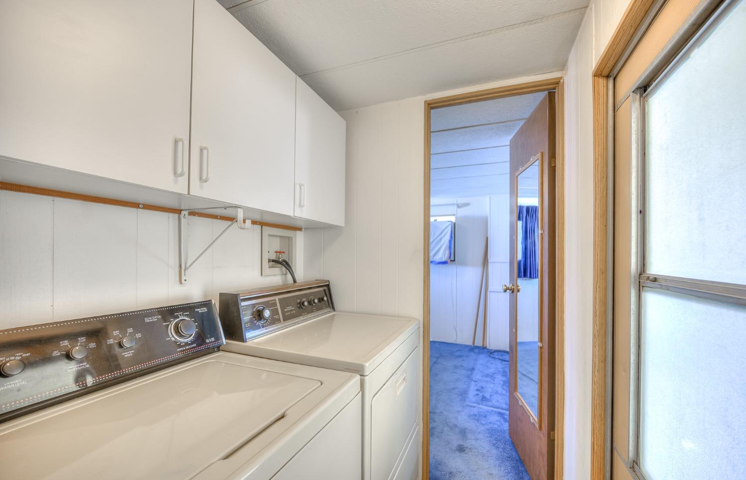 1272 Villa Avenue, Unit 24 Clovis, CA 93612 - Photo 16 of 21 a utility room with dryer and washer