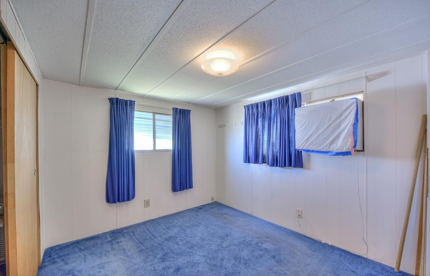 1272 Villa Avenue, Unit 24 Clovis, CA 93612 - Photo 17 of 21 an empty room with windows