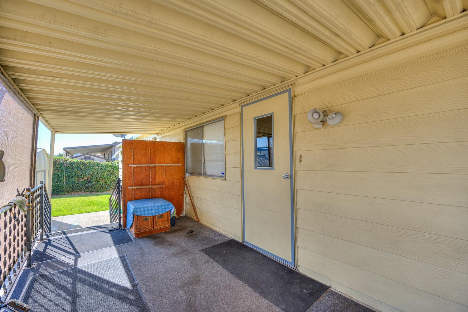1272 Villa Avenue, Unit 24 Clovis, CA 93612 - Photo 5 of 21 a view of a room with wooden floor and iron stairs
