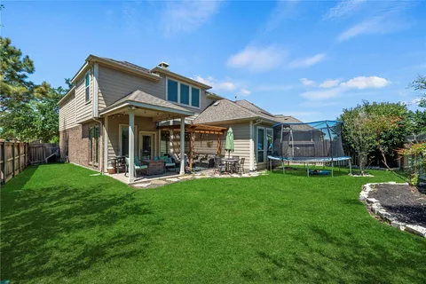 a front view of a house with a garden and porch