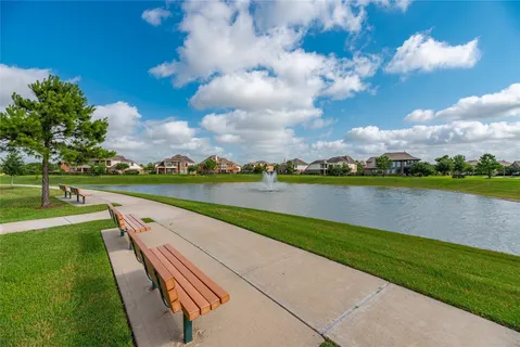 a view of a lake with a big yard