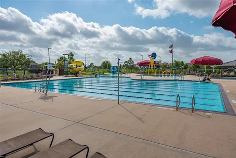 a view of a park with a slide