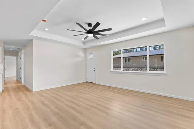 a view of an empty room with a window