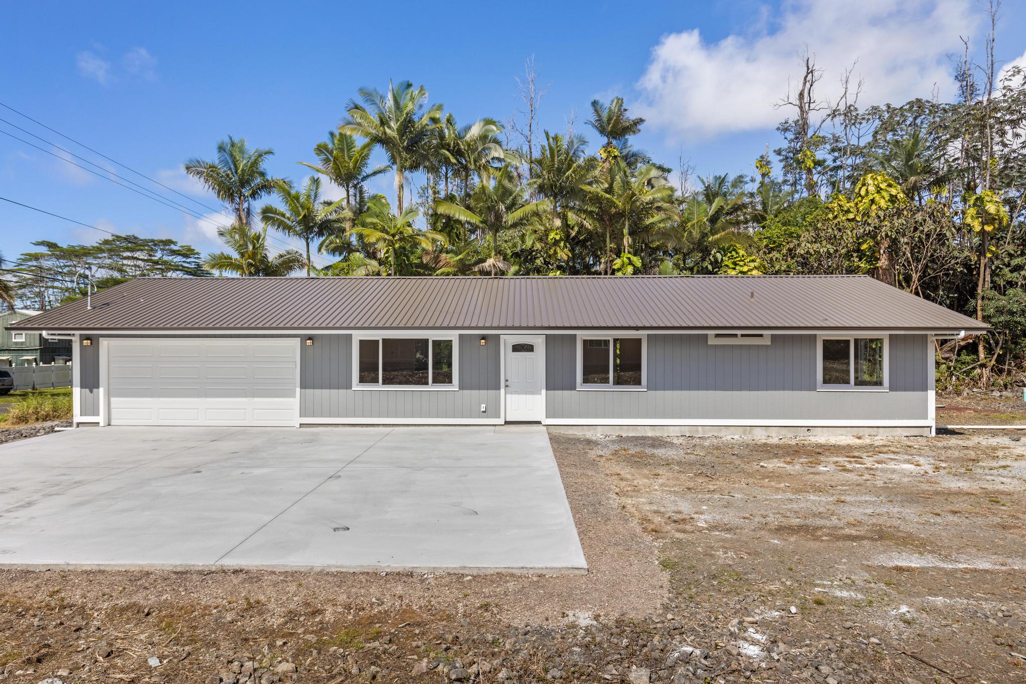16-2579 Ainaloa Drive Pahoa, HI 96778 - Photo 28 of 30 front view of house with a yard