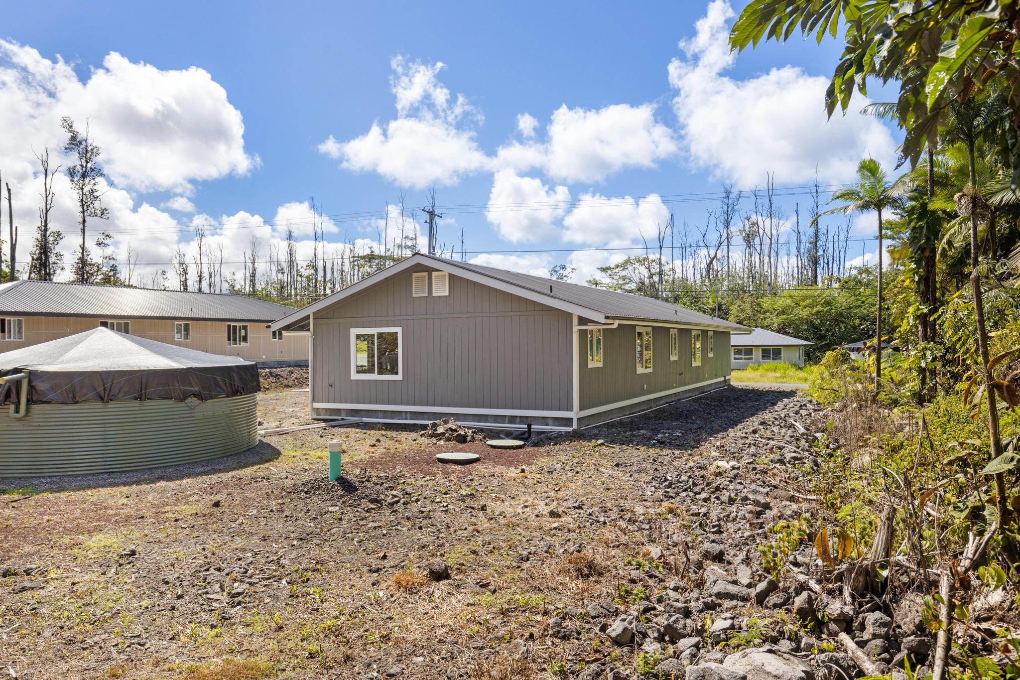 16-2579 Ainaloa Drive Pahoa, HI 96778 - Photo 30 of 30 a view of a house with a yard