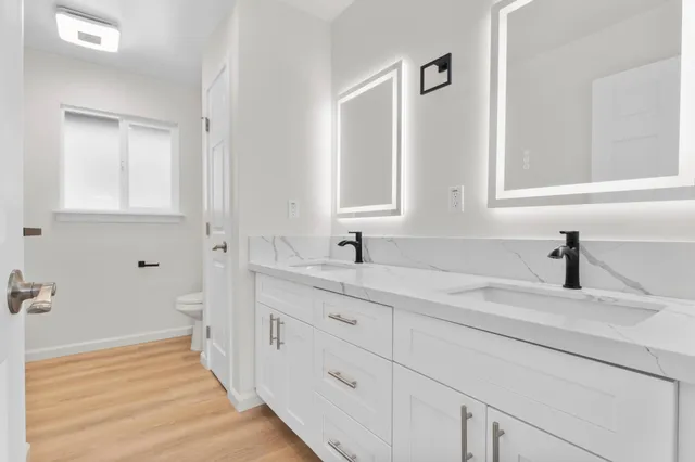 a bathroom with a sink and a mirror