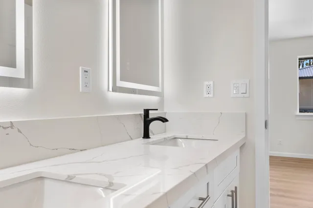 a bathroom with a sink and a bathtub