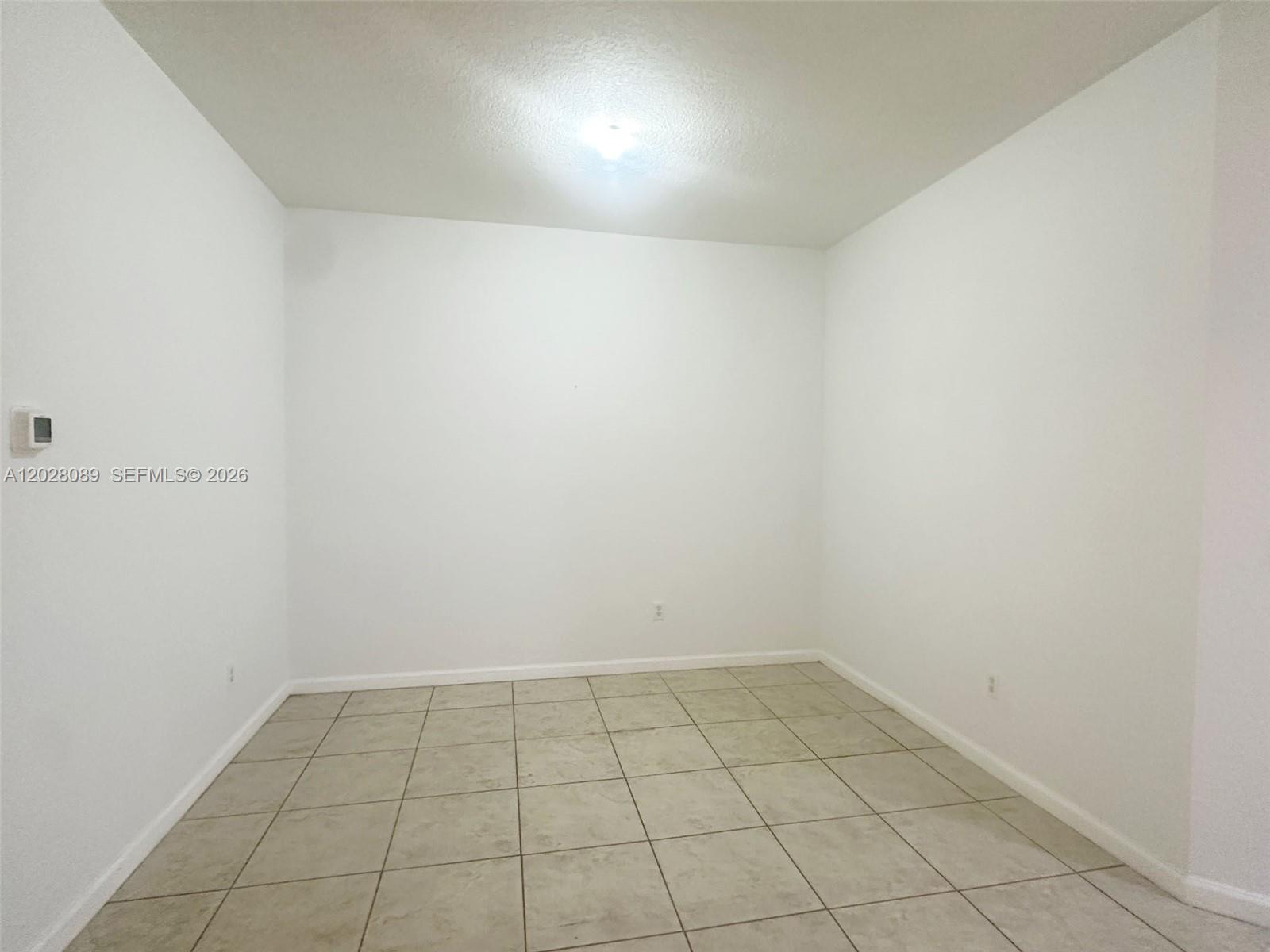 662 Northeast 21st Terrace Homestead, FL 33033 - Photo 4 of 34 a view of an empty room