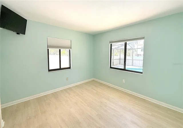 an empty room with windows