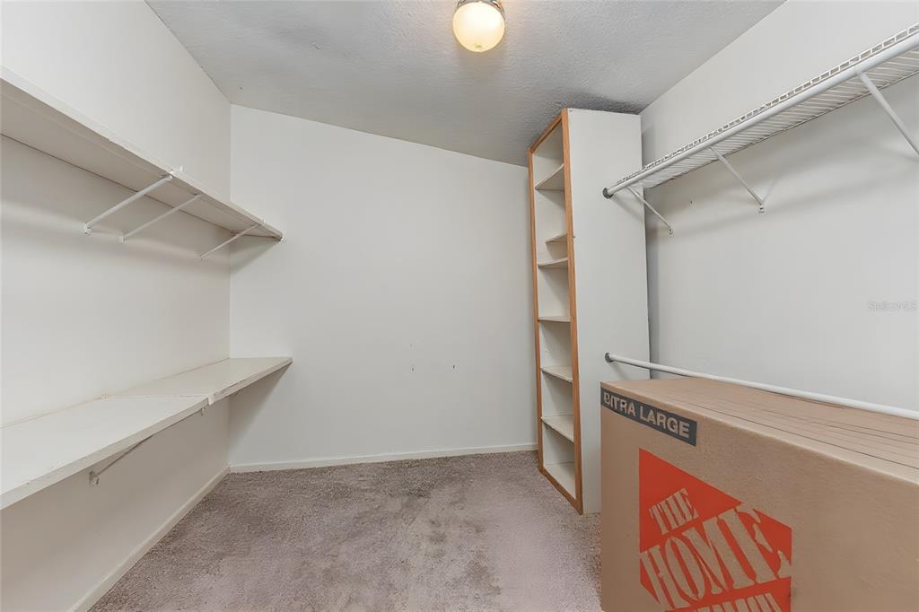 1432 Windmill Pointe Road Palm Harbor, FL 34685 - Photo 11 of 44 a view of an empty walk in closet