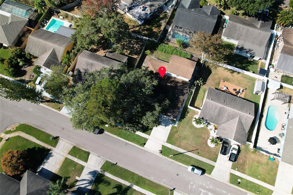 1432 Windmill Pointe Road Palm Harbor, FL 34685 - Photo 21 of 44 an aerial view of multiple houses with yard