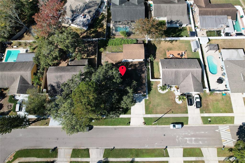 1432 Windmill Pointe Road Palm Harbor, FL 34685 - Photo 22 of 44 an aerial view of houses with outdoor space