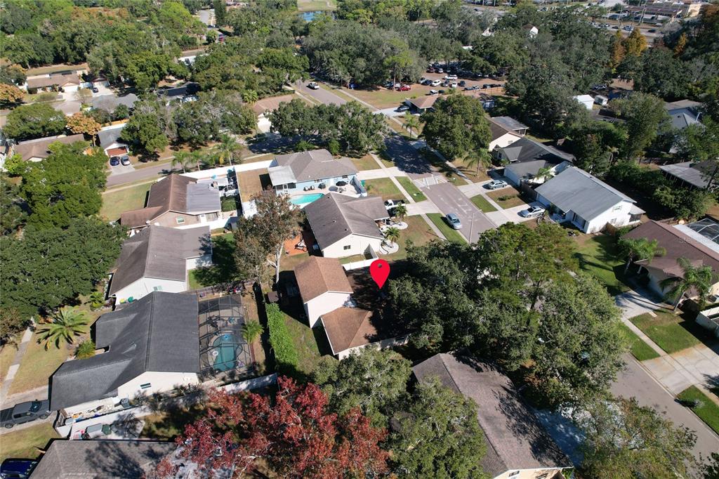 1432 Windmill Pointe Road Palm Harbor, FL 34685 - Photo 24 of 44 an aerial view of a houses with outdoor space