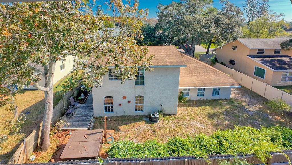 1432 Windmill Pointe Road Palm Harbor, FL 34685 - Photo 42 of 44 front view of a house with a yard
