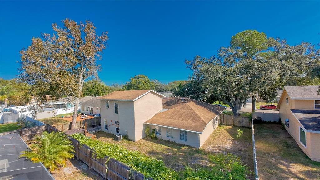 1432 Windmill Pointe Road Palm Harbor, FL 34685 - Photo 44 of 44 a front view of a house with a yard