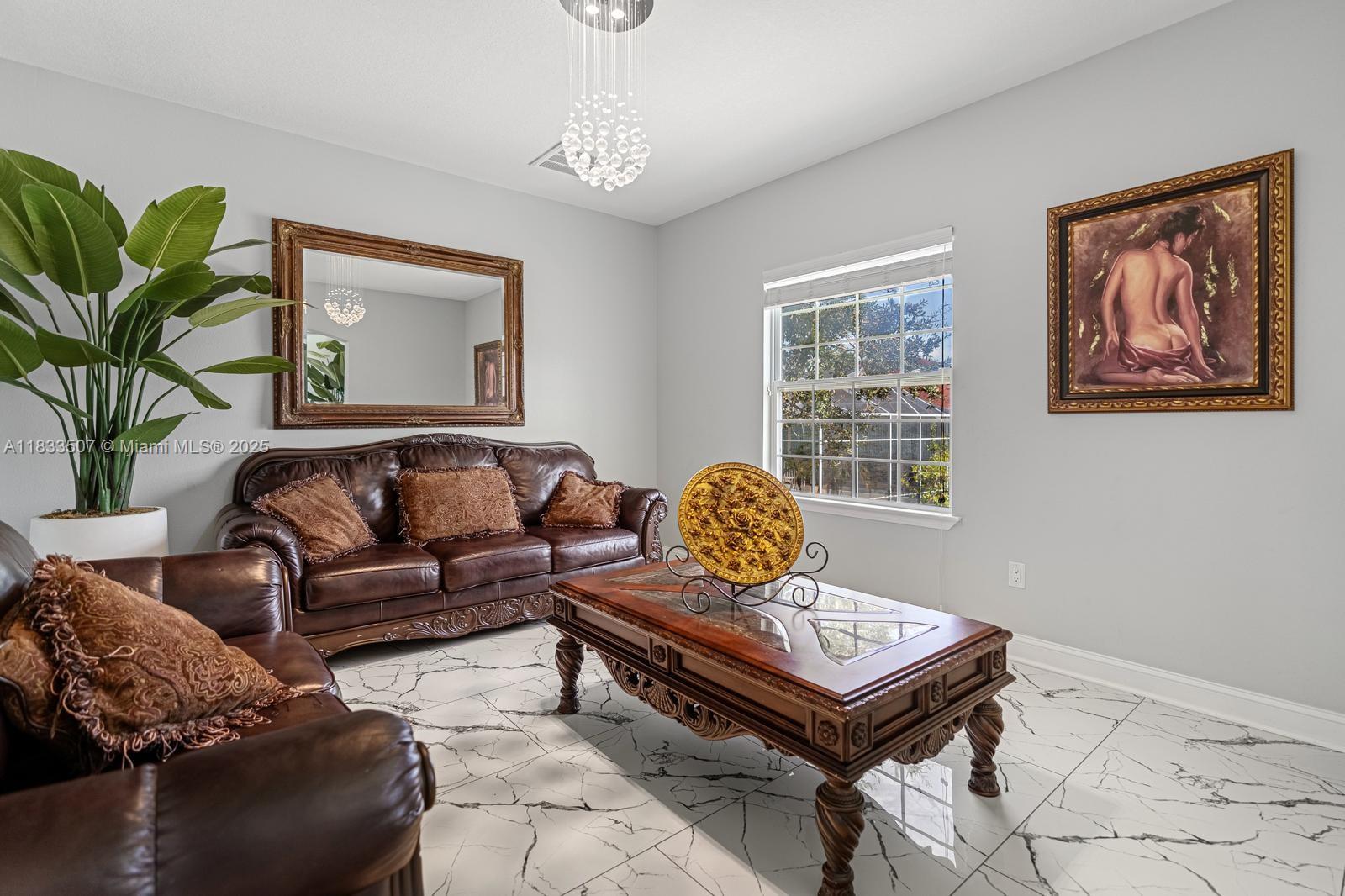 4836 Troydale Road Tampa, FL 33615 - Photo 11 of 52 a living room with furniture