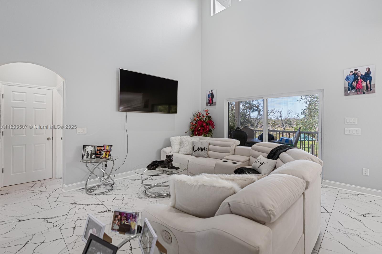 4836 Troydale Road Tampa, FL 33615 - Photo 14 of 52 a living room with furniture