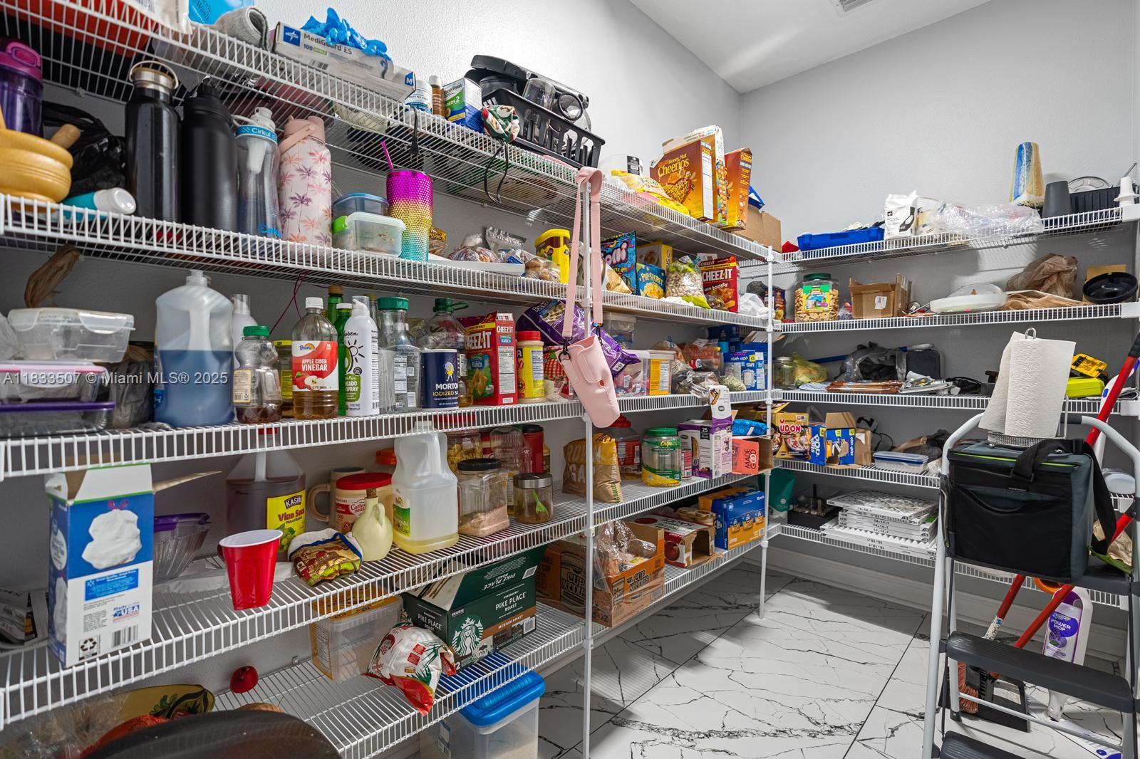 4836 Troydale Road Tampa, FL 33615 - Photo 20 of 52 a store room with lots of different kinds of stuff