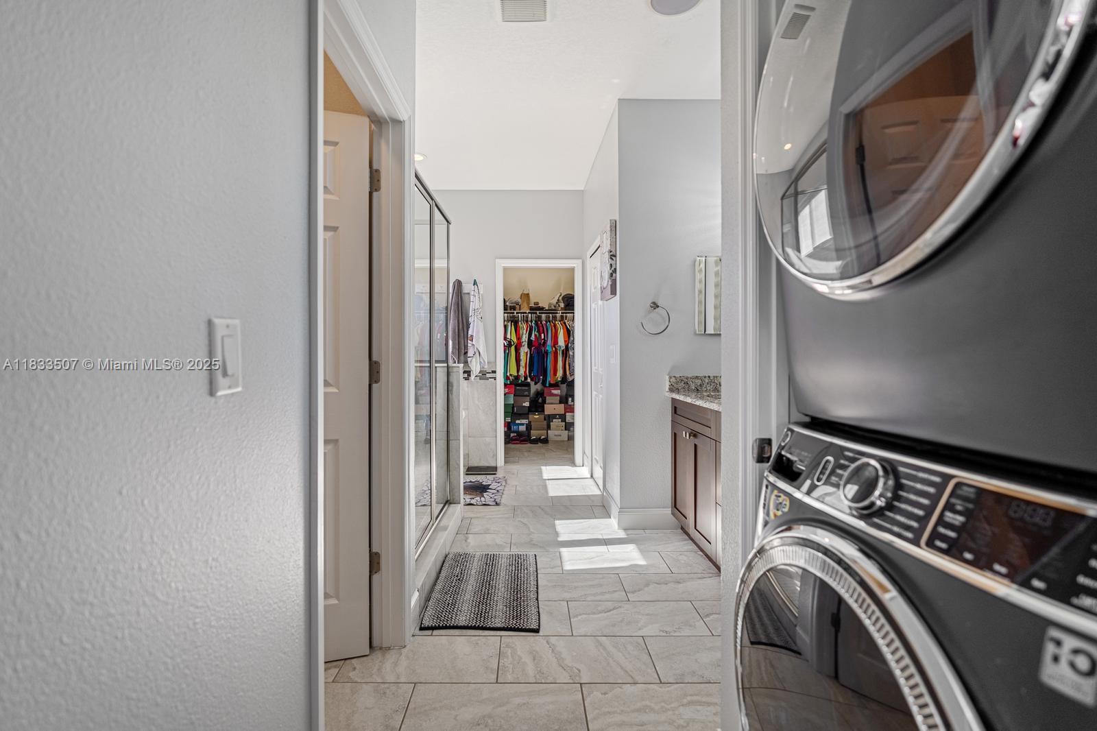 4836 Troydale Road Tampa, FL 33615 - Photo 28 of 52 a view of a hallway with washer and dryer