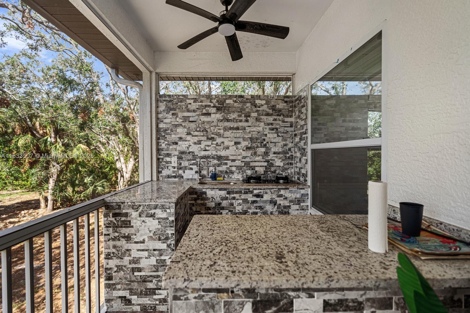 4836 Troydale Road Tampa, FL 33615 - Photo 41 of 52 a view of a porch