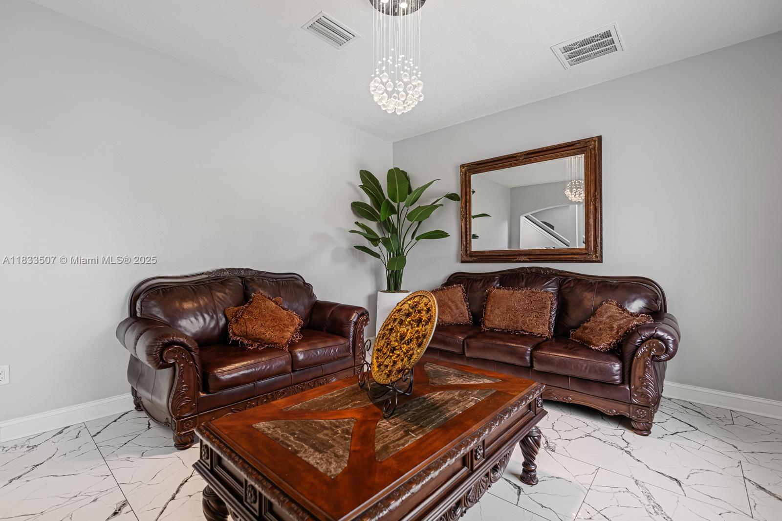 4836 Troydale Road Tampa, FL 33615 - Photo 10 of 52 a living room with furniture