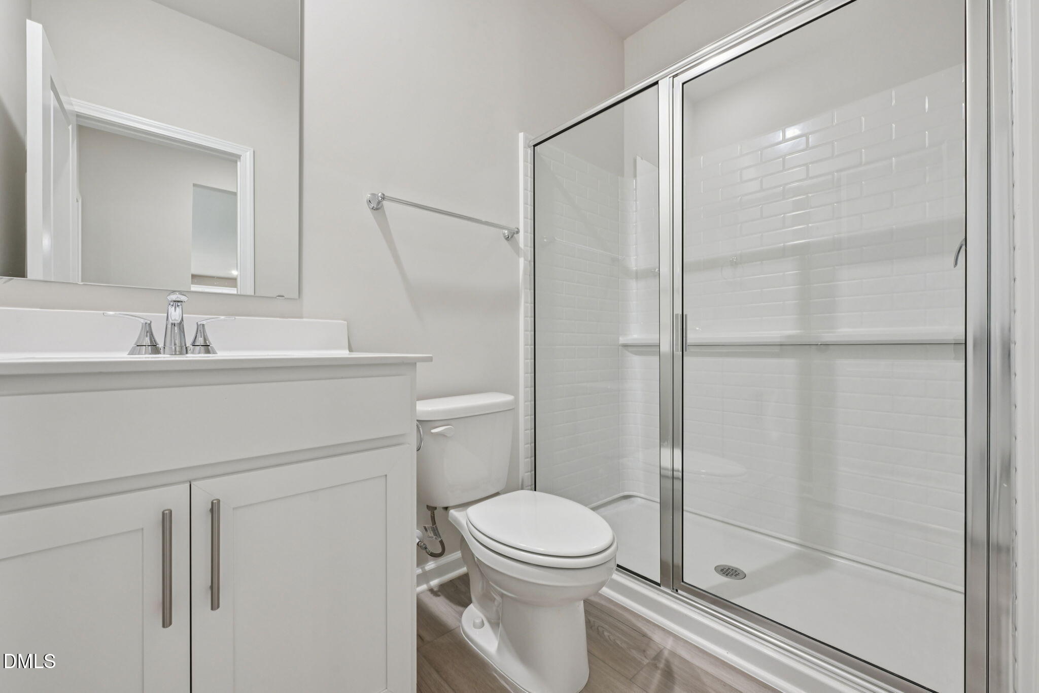 2145 Topsail Road Durham, NC 27703 - Photo 20 of 49 a bathroom with a sink toilet and shower