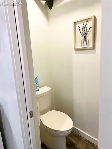 a bathroom with a toilet and a sink