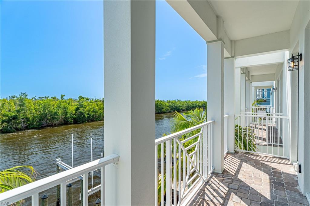 5816 Shell Cove Drive Cape Coral, FL 33914 - Photo 5 of 16 Balcony featuring a water view