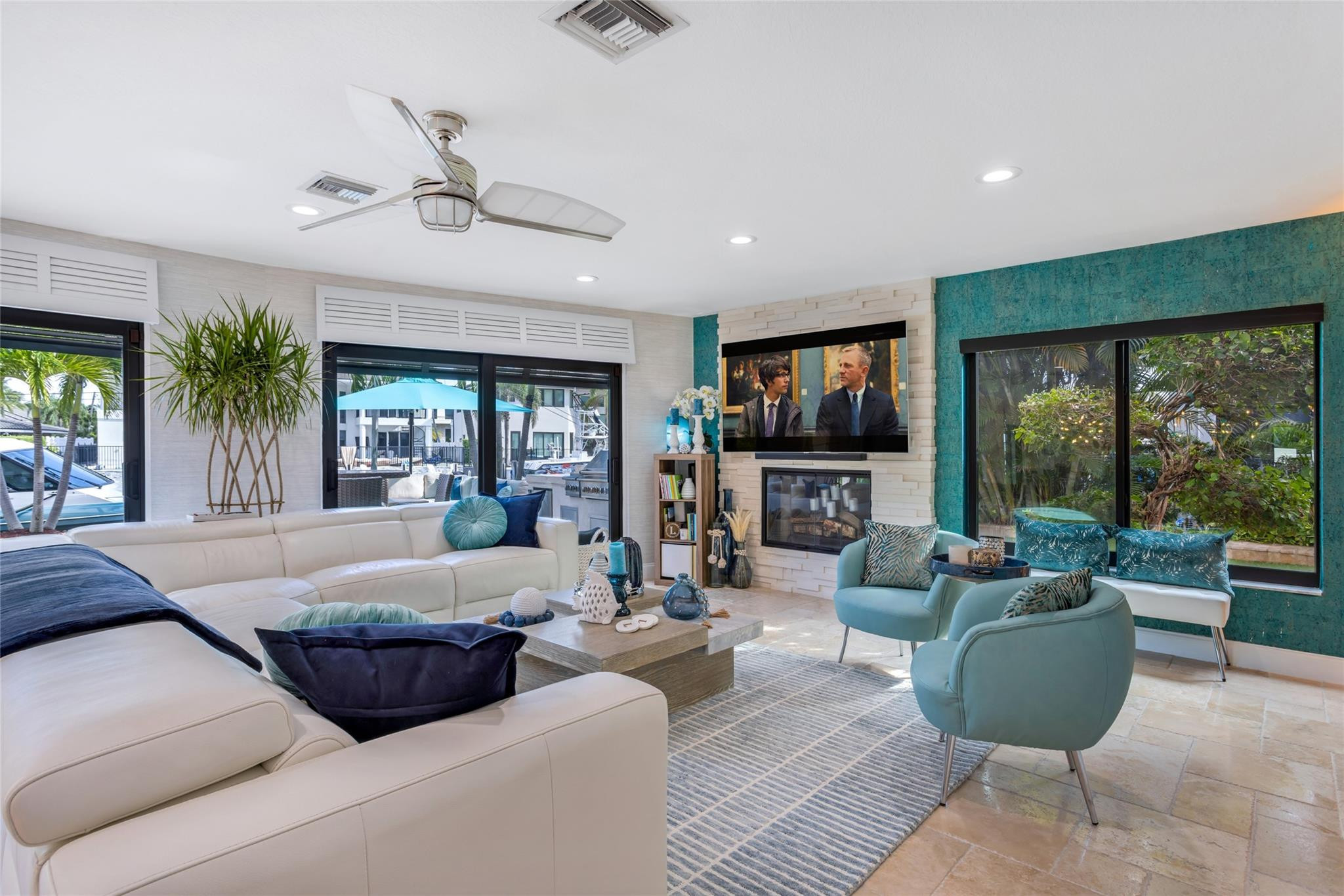 2541 Northeast 48th Street Lighthouse Point, FL 33064 - Photo 12 of 31 a living room with furniture and a flat screen tv