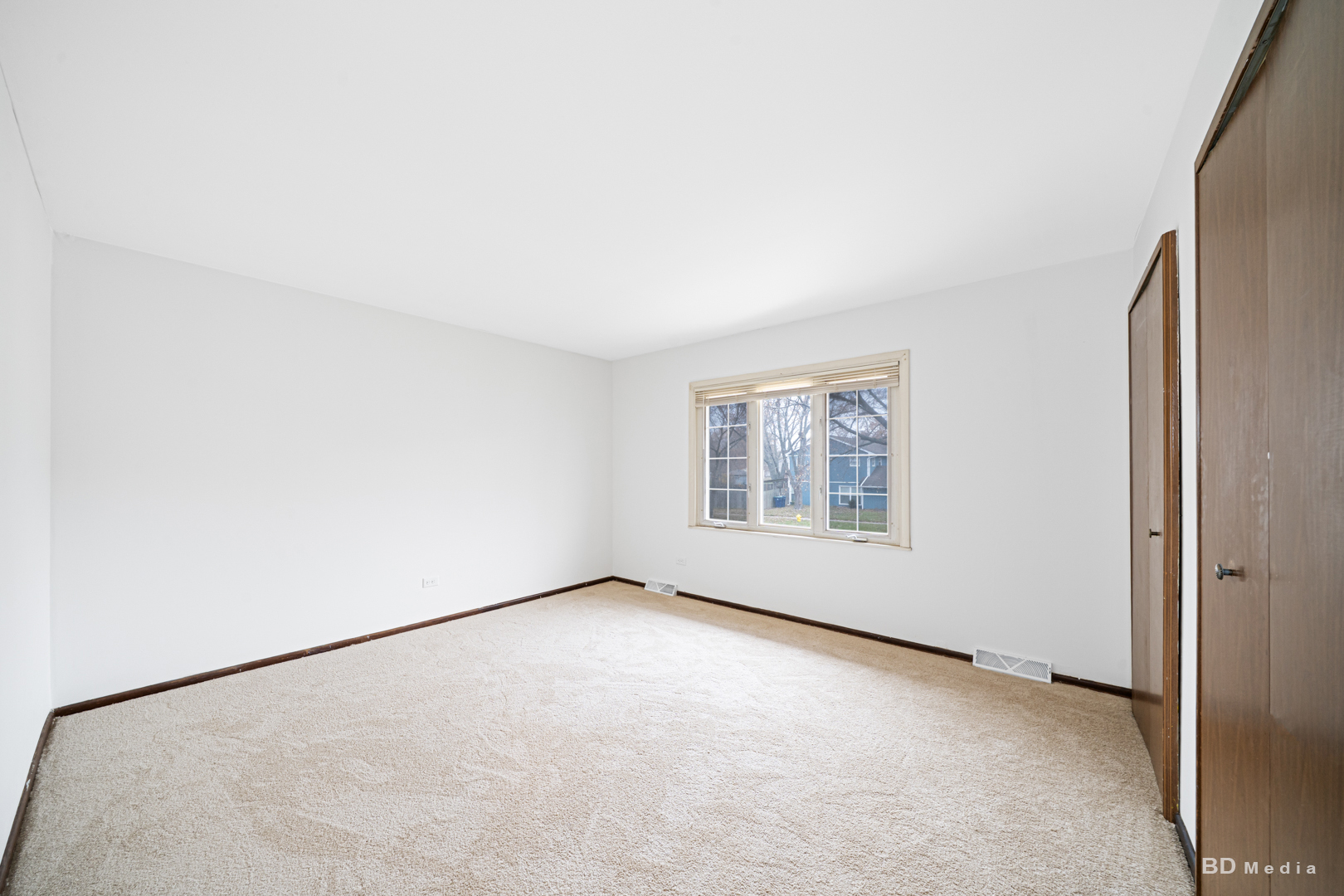 5503 Georgetown Drive Matteson, IL 60443 - Photo 16 of 27 an empty room with a empty space and a window