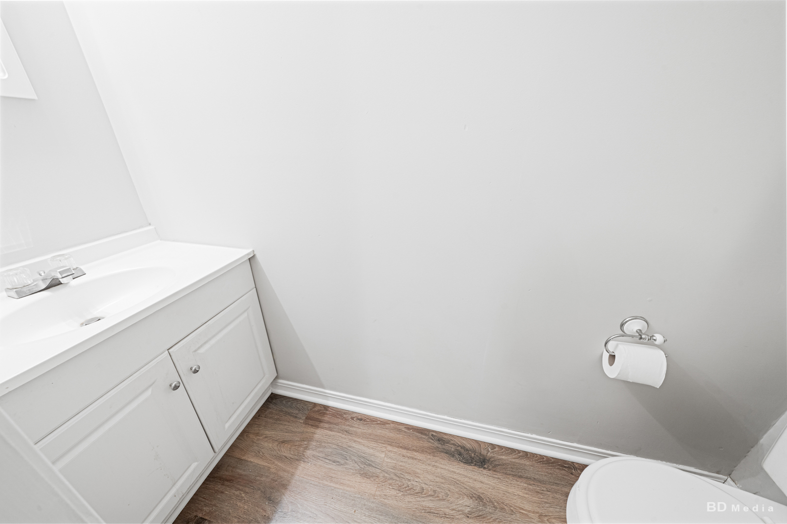 5503 Georgetown Drive Matteson, IL 60443 - Photo 27 of 27 a bathroom with a sink a toilet and vanity