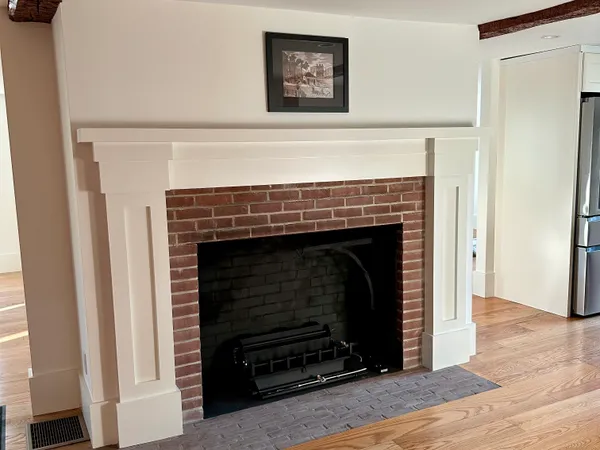 a living room with a fireplace