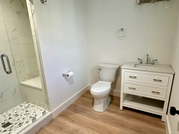 a bathroom with a toilet and a sink