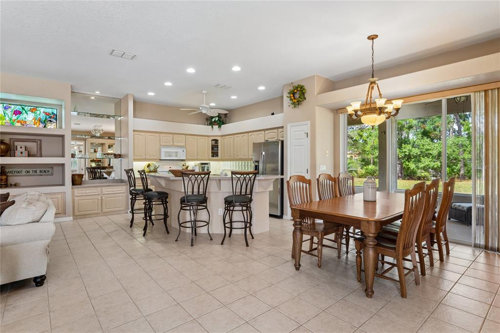 10120 Shortleaf Court Weeki Wachee, FL 34613 - Photo 15 of 95 a view of a dining room with furniture window and outdoor view