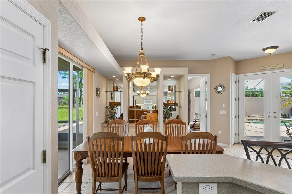 10120 Shortleaf Court Weeki Wachee, FL 34613 - Photo 28 of 95 a view of a dining room with furniture window and outside view