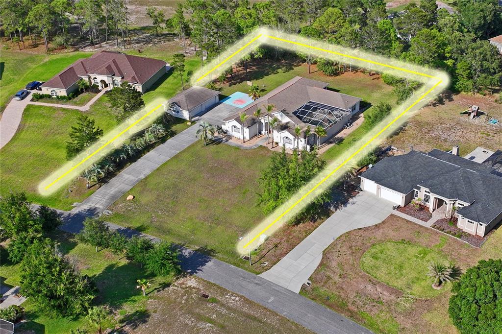 10120 Shortleaf Court Weeki Wachee, FL 34613 - Photo 3 of 95 an aerial view of a house