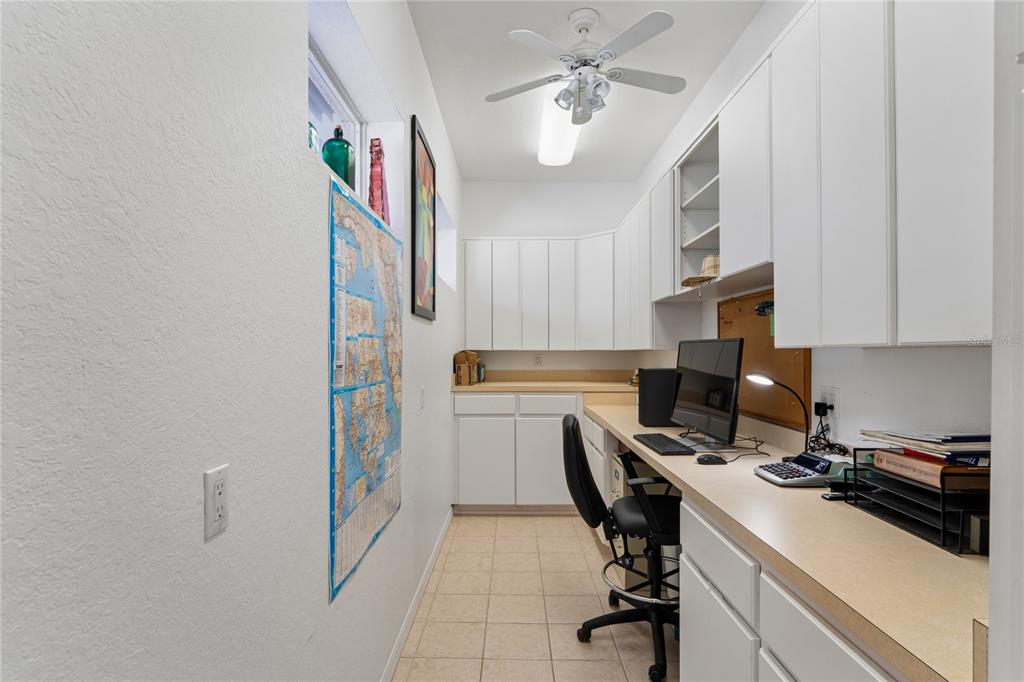 10120 Shortleaf Court Weeki Wachee, FL 34613 - Photo 46 of 95 a view of a workspace with furniture and a window