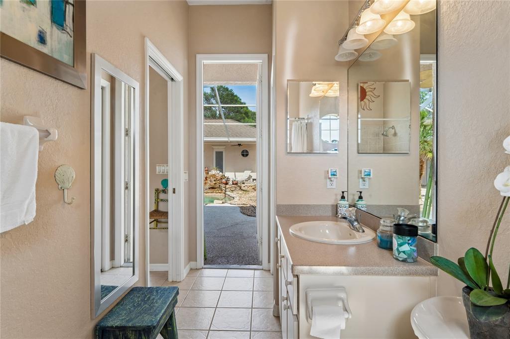 10120 Shortleaf Court Weeki Wachee, FL 34613 - Photo 63 of 95 a bathroom with a sink toilet and shower