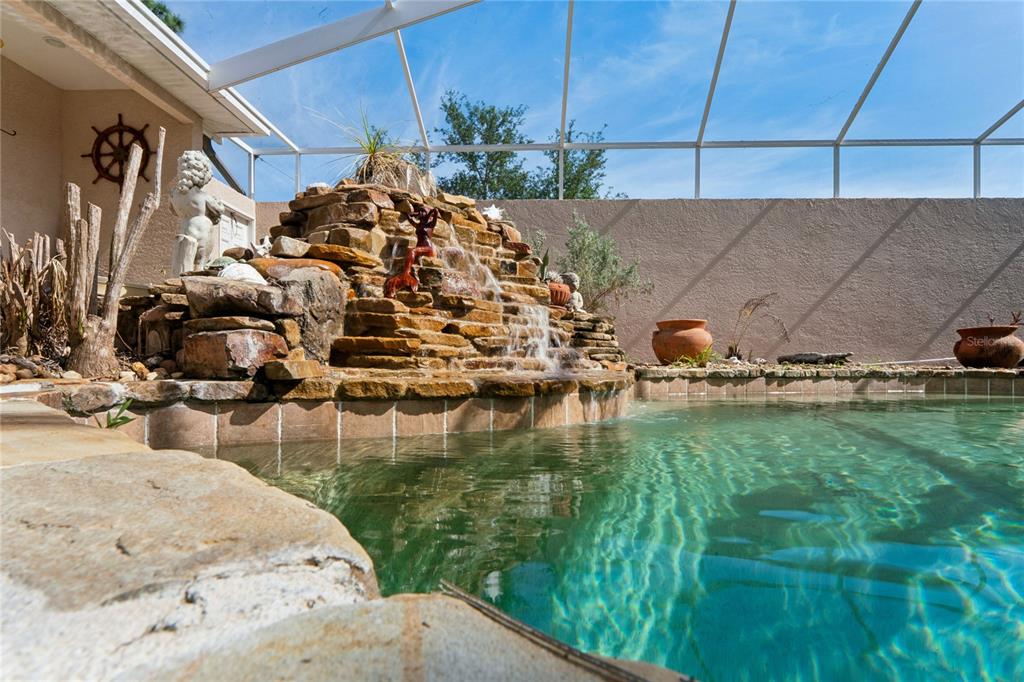 10120 Shortleaf Court Weeki Wachee, FL 34613 - Photo 67 of 95 a view of swimming pool from a lake view