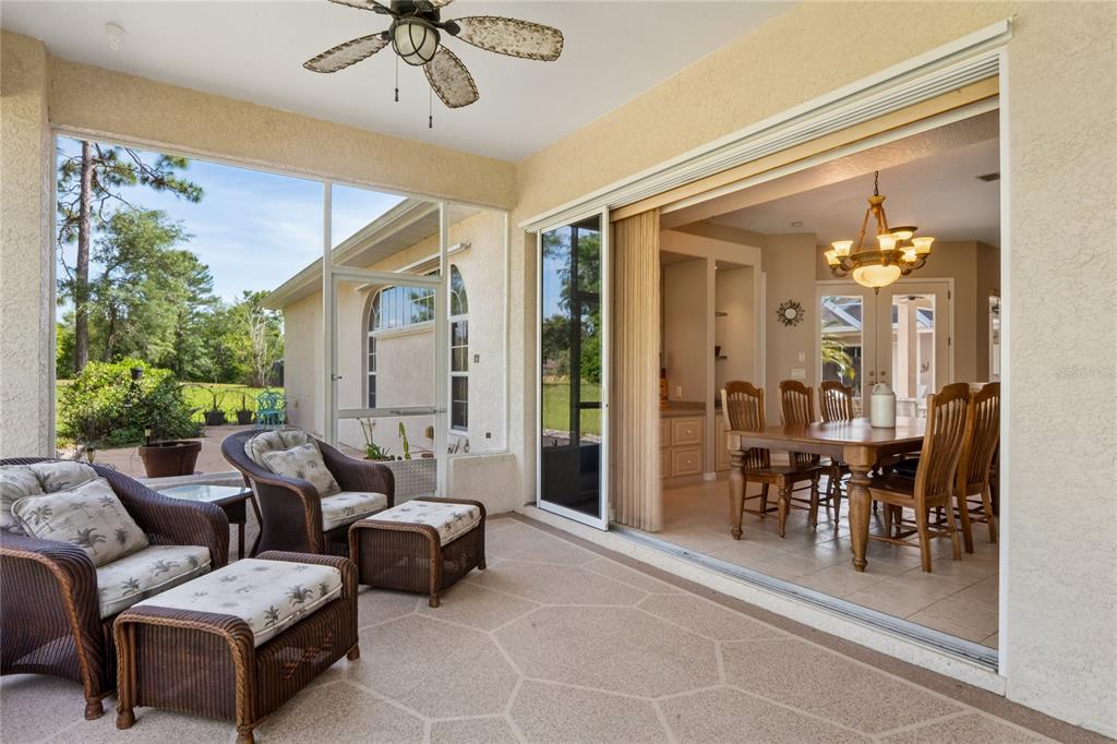 10120 Shortleaf Court Weeki Wachee, FL 34613 - Photo 75 of 95 a living room with furniture and a large window
