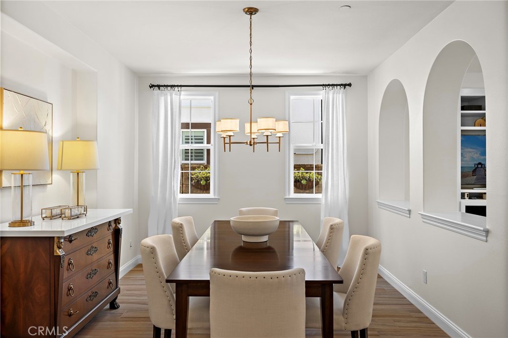 3 Tranquility Place Ladera Ranch, CA 92694 - Photo 11 of 63 a view of a dining room with furniture and window