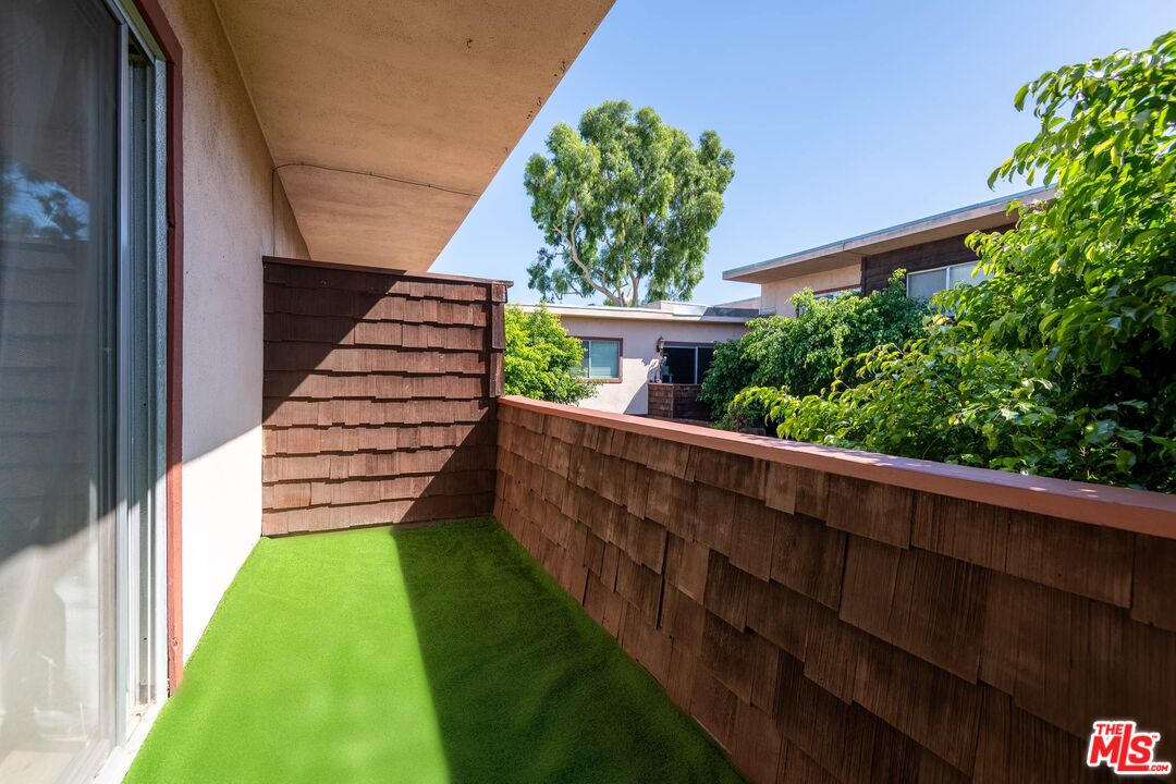 5403 Newcastle Avenue, Unit 69 Encino, CA 91316 - Photo 22 of 34 a view of a yard with potted plants