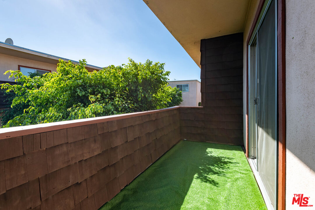 5403 Newcastle Avenue, Unit 69 Encino, CA 91316 - Photo 23 of 34 a view of a backyard with plants