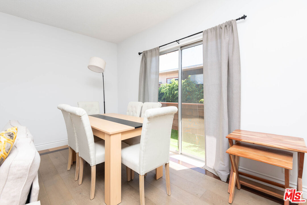 5403 Newcastle Avenue, Unit 69 Encino, CA 91316 - Photo 3 of 34 a view of a dining room with furniture window and outside view