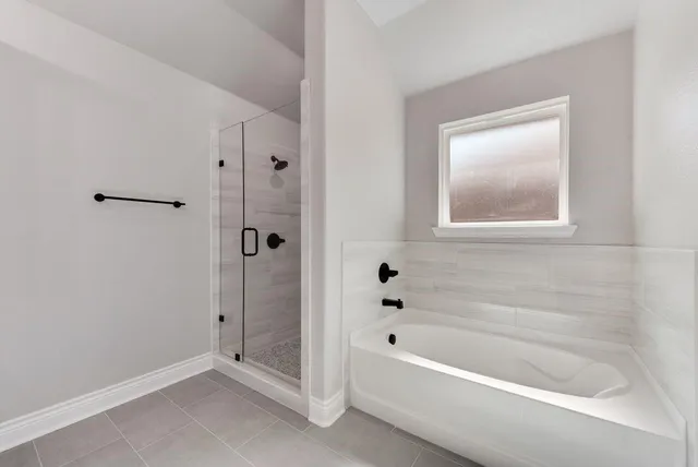 a bathroom with a double vanity sink mirror and double
