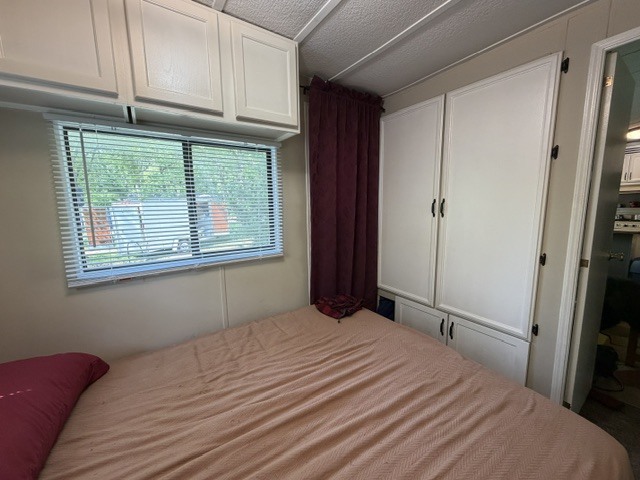 2795 East 28th Road Marseilles, IL 61341 - Photo 10 of 63 a bedroom with a bed and a window