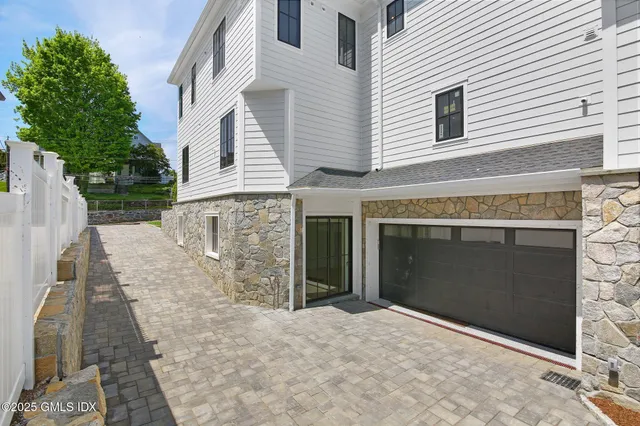 a front view of a house with yard